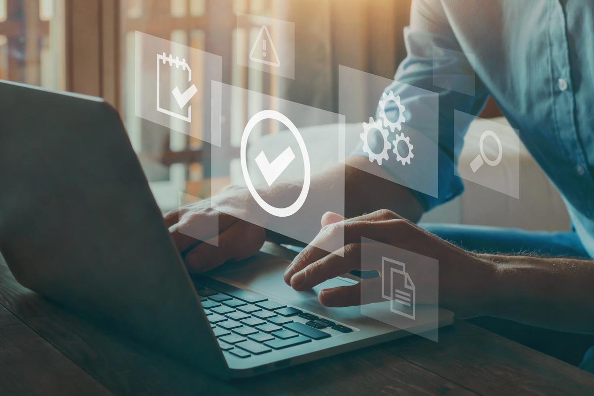 Laptop with icons – quality control management software